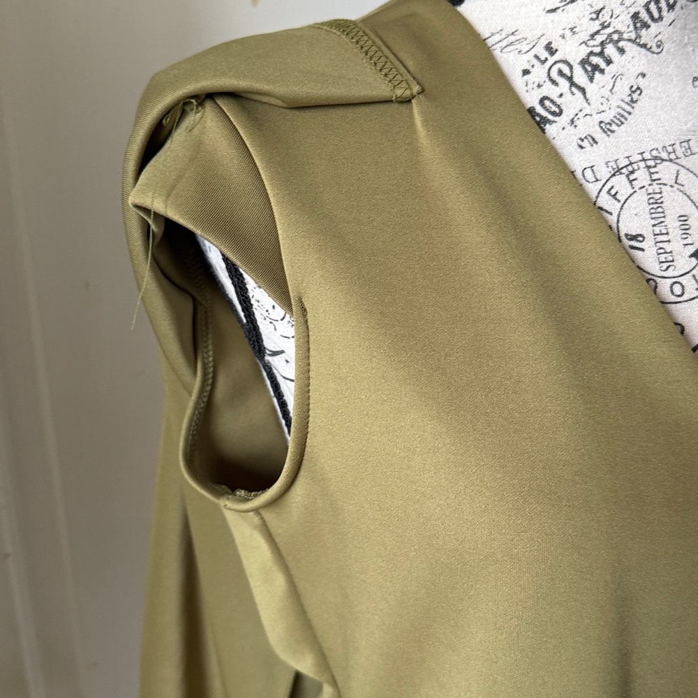PrettyLittleThing Green Open Front Vest with open long sleeves size 10.